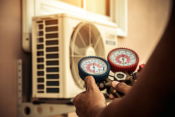 Professional Heat Pump Repair technician working in Fork, MD